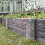 Landscape area with retaining wall