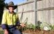 William Crabb from Plant-EM Townsville in front of a DIY Edible garden